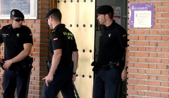Spanish police raid town halls, businesses in latest graft inquiry